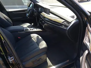 2017 BMW X5 sDrive35i with VIN 5UXKR2C5XH0U17833, listed as a IAAI auction lot 41856074 with 115,666 mi miles. Bid and sale history available at carsss.com. Image 5.