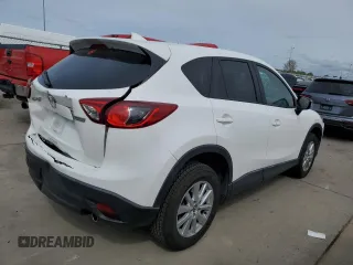 2016 Mazda CX-5 Touring with VIN JM3KE2CYXG0777715, listed as a Copart auction lot 52157005 with 58,585 mi miles and Salvage Title. Bid and sale history available at carsss.com. Image 3.