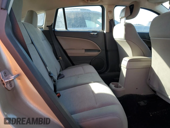 2010 Dodge Caliber Mainstreet z VIN 1B3CB3HA8AD638921, wystawiony jako Copart lot #49871265 z przebiegiem 152 109 mil mil oraz Szkody całkowita. Historia ofert i sprzedaży dostępna na DreamBid. Obrazek 11.