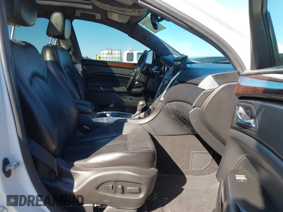 2012 Cadillac SRX Performance Collection с VIN 3GYFNEE33CS585109, выставлен на аукционе IAAI как лот 41657155 с пробегом 155 013 миль миль и . История ставок и продаж доступна на DreamBid. Изображение 5.