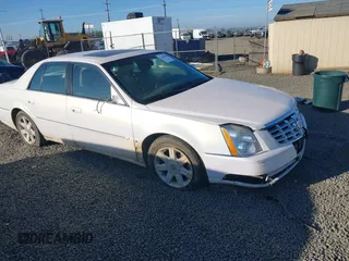 2006 Cadillac DTS 1SD z VIN 1G6KD57Y86U219220, wystawiony jako IAAI lot #42047694 z przebiegiem 110 051 mil mil oraz . Historia ofert i sprzedaży dostępna na DreamBid. Obrazek 1.