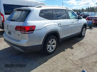 2018 Volkswagen Atlas SE with VIN 1V2LR2CA7JC524893, listed as a IAAI auction lot 41876288 with 153,758 mi miles and . Bid and sale history available at DreamBid. Image 4.