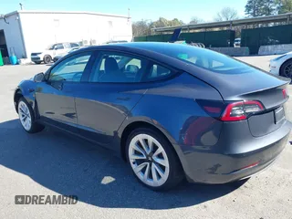 2022 Tesla Model 3 Long Range with VIN 5YJ3E1EB3NF290550, listed as a IAAI auction lot 41826287 with 67,648 mi miles and . Bid and sale history available at DreamBid. Image 3.