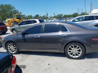 2011 Chevrolet Malibu LTZ with VIN 1G1ZE5E75BF184694, listed as a IAAI auction lot 42002433 with 185,724 mi miles and . Bid and sale history available at DreamBid. Image 14.