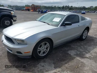 2012 Ford Mustang Premium with VIN 1ZVBP8AMXC5277683, listed as a IAAI auction lot 41674173 with 219,243 mi miles and . Bid and sale history available at carsss.com. Image 2.
