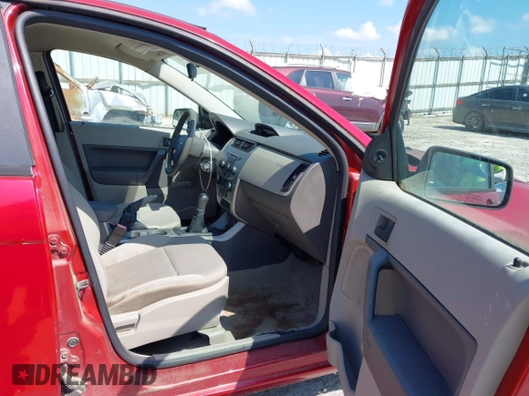 2009 Ford Focus S with VIN 1FAHP34N69W102568, listed as a IAAI auction lot 42137185 with 113,099 mi miles. Bid and sale history available at carsss.com. Image 5.