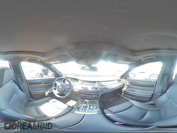 2013 BMW 7 Series 740i with VIN WBAYA6C58DC994974, listed as a Copart auction lot 55534645 with 106,975 mi miles and Salvage title. Bid and sale history available at DreamBid. Image 14.