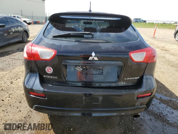 2009 Mitsubishi Lancer z VIN JA3AX88W99U613116, wystawiony jako Copart lot #58765855 z przebiegiem 256 289 mil mil oraz Czysty tytuł • Clean title. Historia ofert i sprzedaży dostępna na DreamBid. Obrazek 6.