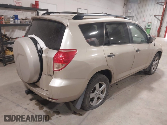 2008 Toyota RAV4 with VIN JTMBK33V185056054, listed as a IAAI auction lot 41702082 with 256,189 mi miles. Bid and sale history available at carsss.com. Image 4.