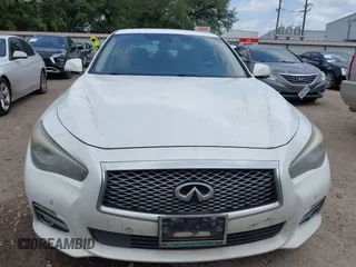 2014 Infiniti Q50 Hybrid Sport with VIN JN1AV7AP7EM690553, listed as a IAAI auction lot 42196341 with 221,709 mi miles and . Bid and sale history available at DreamBid. Image 12.