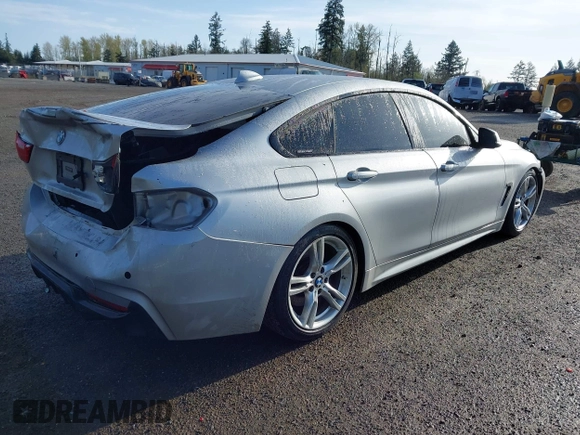 2016 BMW 4 Series 428i xDrive with VIN WBA4C9C5XGG135893, listed as a IAAI auction lot 41976541 with 86,987 mi miles and . Bid and sale history available at carsss.com. Image 4.
