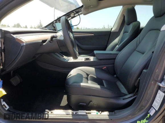 2023 Tesla Model 3 with VIN 5YJ3E1EA4PF615975, listed as a Copart auction lot 58845405 with 38,927 mi miles and Salvage title. Bid and sale history available at DreamBid. Image 7.