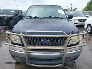 2003 Ford F-150 XLT with VIN 1FTRW07L33KC83234, listed as a IAAI auction lot 41894573 with 215,232 mi miles. Bid and sale history available at carsss.com. Image 12.