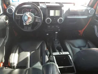 2015 Jeep Wrangler Unlimited Rubicon Hard Rock z VIN 1C4HJWFG7FL690098, wystawiony jako Copart lot #47431555 z przebiegiem 95 138 mil mil oraz Szkoda całkowita • Salvage title. Historia ofert i sprzedaży dostępna na DreamBid. Obrazek 8.
