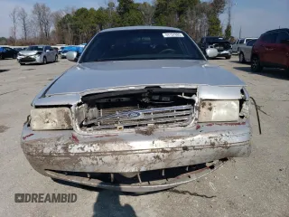 2003 Ford Police Interceptor Street Appear with VIN 2FAFP71WX3X110275, listed as a Copart auction lot 44157665 with 275,661 mi miles and Salvage title. Bid and sale history available at DreamBid. Image 5.