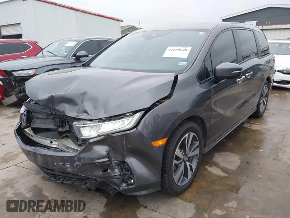 2021 Honda Odyssey Touring with VIN 5FNRL6H86MB021504, listed as a IAAI auction lot 41550040 with 55,068 mi miles. Bid and sale history available at carsss.com. Image 21.