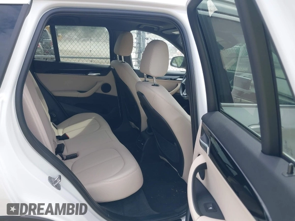 2021 BMW X1 xDrive28i with VIN WBXJG9C07M5U21337, listed as a IAAI auction lot 42590859 with 35,934 mi miles and . Bid and sale history available at DreamBid. Image 8.