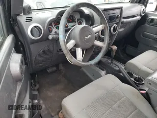 2009 Jeep Wrangler Sahara with VIN 1J4FA54109L702963, listed as a Copart auction lot 89211555 with 125,138 mi miles and Clean title. Bid and sale history available at DreamBid. Image 8.