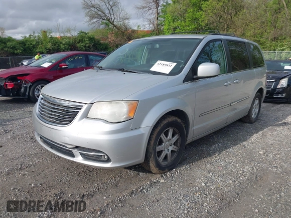 2011 Chrysler Town & Country Touring with VIN 2A4RR5DG4BR682109, listed as a IAAI auction lot 42189832 with 208,709 mi miles and . Bid and sale history available at DreamBid. Image 2.