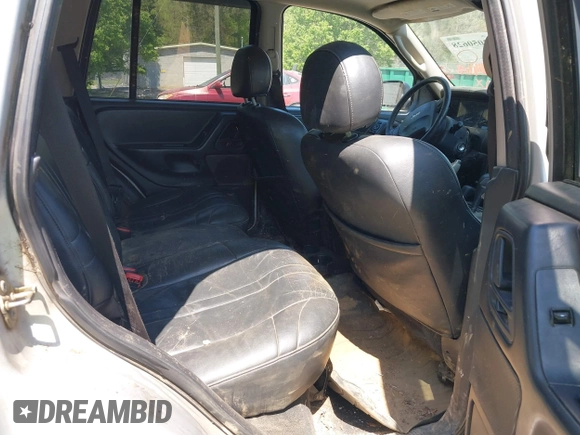 2004 Jeep Grand Cherokee Laredo with VIN 1J4GW48S74C260968, listed as a IAAI auction lot 42050628 with 192,602 mi miles. Bid and sale history available at carsss.com. Image 8.