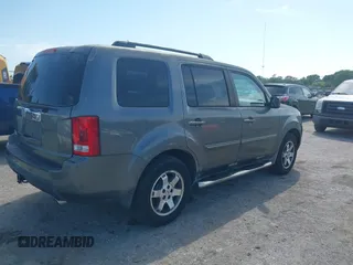 2011 Honda Pilot EX with VIN 5FNYF3H4XBB001140, listed as a IAAI auction lot 41940476 with 254,136 mi miles and . Bid and sale history available at carsss.com. Image 4.