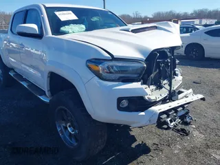 2021 Toyota Tacoma 4WD SR5 with VIN 3TYDZ5BN4MT000619, listed as a IAAI auction lot 41886686 with 91,338 mi miles. Bid and sale history available at carsss.com. Image 6.