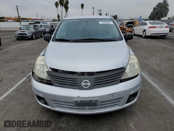 2009 Nissan Versa 1.6 with VIN 3N1CC11E79L429613, listed as a Copart auction lot 72220034 with 134,891 mi miles and Salvage Title. Bid and sale history available at carsss.com. Image 5.