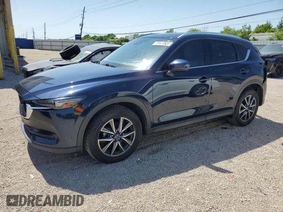 2018 Mazda CX-5 Grand Touring с VIN JM3KFBDM8J0344328, выставлен на аукционе Copart как лот 57665175 с пробегом 131 175 миль миль и Списание • Salvage title. История ставок и продаж доступна на DreamBid. Изображение 1.