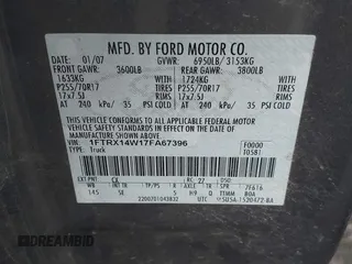2007 Ford F-150 STX with VIN 1FTRX14W17FA67396, listed as a IAAI auction lot 41007693 with 273,113 mi miles. Bid and sale history available at carsss.com. Image 9.