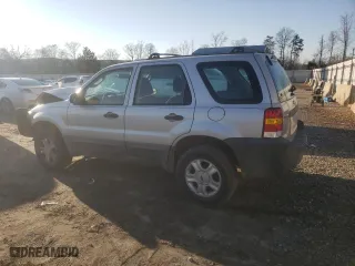 2007 Ford Escape XLS with VIN 1FMYU02Z27KA84268, listed as a Copart auction lot 87313374 with 157,968 mi miles and Non Repairable. Bid and sale history available at carsss.com. Image 2.