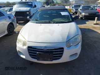 2005 Chrysler Sebring GTC with VIN 1C3EL75R55N613856, listed as a IAAI auction lot 41820747 with Not Provided miles and . Bid and sale history available at DreamBid. Image 6.