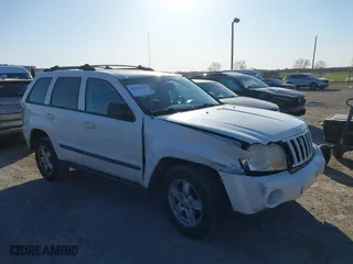 2007 Jeep Grand Cherokee Laredo with VIN 1J8GR48K37C525797, listed as a IAAI auction lot 41929118 with 244,092 mi miles. Bid and sale history available at carsss.com. Image 1.