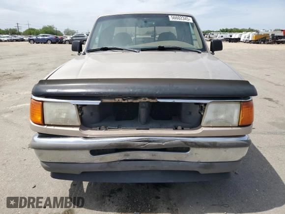 1996 Ford Ranger XL with VIN 1FTCR14A7TPB11488, listed as a Copart auction lot 56602345 with 177,214 mi miles and Salvage title. Bid and sale history available at DreamBid. Image 5.