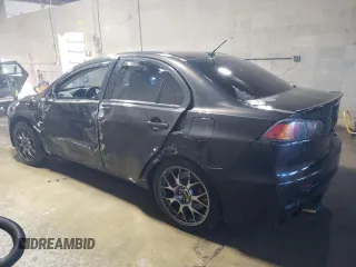 2014 Mitsubishi Lancer Evolution MR with VIN JA32W5FV4EU025232, listed as a Copart auction lot 89271835 with 85,902 mi miles and Salvage Title. Bid and sale history available at carsss.com. Image 2.