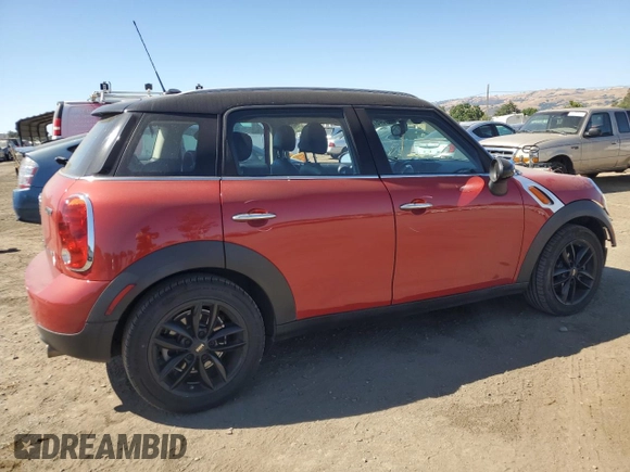 2014 MINI Countryman with VIN WMWZB3C5XEWR42035, listed as a Copart auction lot 61846725 with 105,131 mi miles and Salvage title. Bid and sale history available at DreamBid. Image 3.