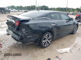2016 Nissan Maxima SV with VIN 1N4AA6AP8GC426999, listed as a IAAI auction lot 42627802 with 160,643 mi miles and . Bid and sale history available at DreamBid. Image 4.