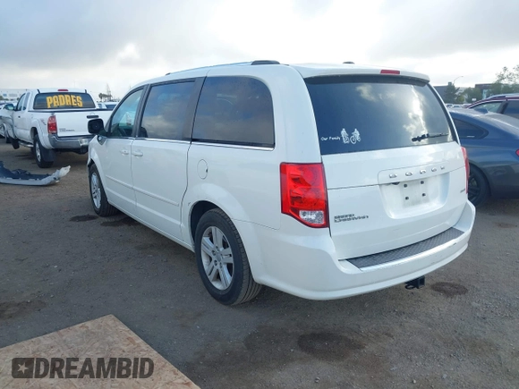 2013 Dodge Grand Caravan Crew with VIN 2C4RDGDG4DR606263, listed as a IAAI auction lot 41898351 with 127,044 mi miles and . Bid and sale history available at DreamBid. Image 3.