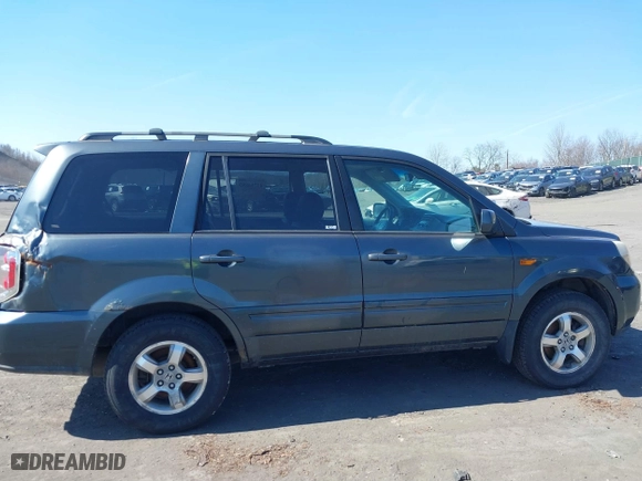 2006 Honda Pilot EX-L with RES with VIN 2HKYF18646H501940, listed as a IAAI auction lot 41714893 with 353,448 mi miles. Bid and sale history available at carsss.com. Image 6.