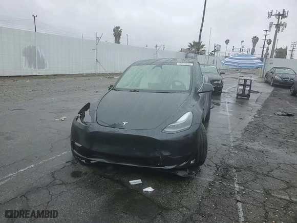2024 Tesla Model Y with VIN 7SAYGDED5RF054851, listed as a Copart auction lot 42835055 with 14,695 mi miles and Salvage Title. Bid and sale history available at carsss.com. Image 11.