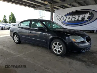 2005 Nissan Altima 2.5 with VIN 1N4AL11D45C155651, listed as a Copart auction lot 56910945 with 115,877 mi miles and Salvage title. Bid and sale history available at DreamBid. Image 4.