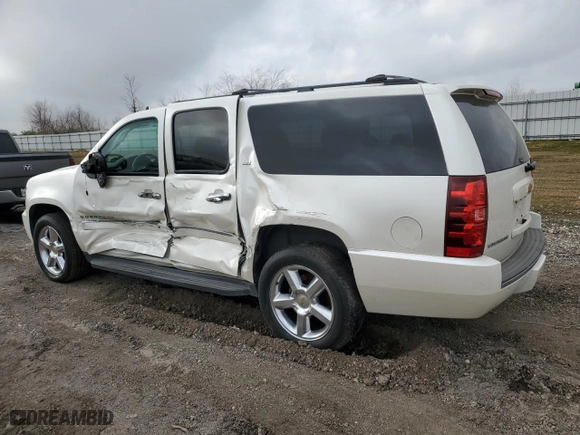 2012 Chevrolet Suburban LTZ with VIN 1GNSCKE02CR199645, listed as a Copart auction lot 47209145 with 128,454 mi miles and Salvage Title. Bid and sale history available at carsss.com. Image 2.