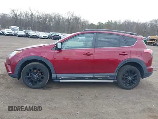2018 Toyota RAV4 XLE with VIN 2T3RFREV4JW798868, listed as a IAAI auction lot 41751618 with 76,003 mi miles. Bid and sale history available at carsss.com. Image 14.