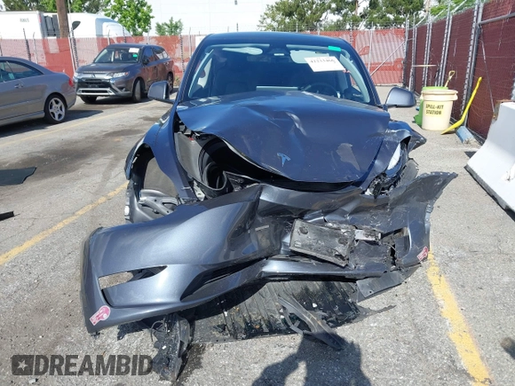 2023 Tesla Model Y Long Range with VIN 7SAYGDEE7PA192488, listed as a IAAI auction lot 42233466 with Not provided miles and . Bid and sale history available at DreamBid. Image 6.