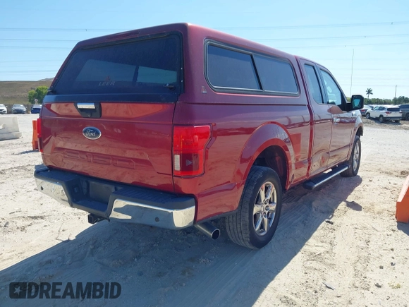2018 Ford F-150 XL z VIN 1FTEX1C5XJKD87760, wystawiony jako IAAI lot #42016828 z przebiegiem 121 297 mil mil oraz . Historia ofert i sprzedaży dostępna na DreamBid. Obrazek 4.