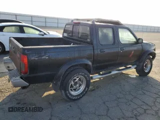 2000 Nissan Frontier XE z VIN 1N6ED27Y2YC369211, wystawiony jako Copart lot #80594884 z przebiegiem 225 194 mil mil oraz Czysty tytuł • Clean title. Historia ofert i sprzedaży dostępna na DreamBid. Obrazek 3.