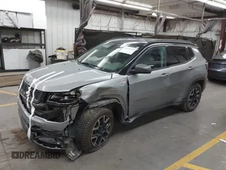 2020 Jeep Compass Trailhawk with VIN 3C4NJDDB7LT203447, listed as a IAAI auction lot 42637452 with 113,896 mi miles and . Bid and sale history available at DreamBid. Image 2.