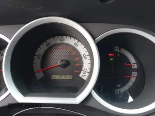2014 Toyota Tacoma PreRunner z VIN 3TMJU4GNXEM164121, wystawiony jako IAAI lot #42568581 z przebiegiem 201 316 mil mil oraz . Historia ofert i sprzedaży dostępna na DreamBid. Obrazek 7.