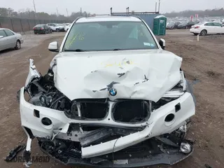 2016 BMW X5 xDrive35i with VIN 5UXKR0C57G0P24296, listed as a IAAI auction lot 41815189 with 116,084 mi miles. Bid and sale history available at carsss.com. Image 12.