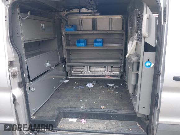 2020 Ford Transit Cargo z VIN 1FTYE1Y80LKB53684, wystawiony jako IAAI lot #42556377 z przebiegiem 102 801 mil mil oraz . Historia ofert i sprzedaży dostępna na DreamBid. Obrazek 8.