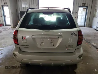 2004 Pontiac Vibe z VIN 5Y2SM62824Z432030, wystawiony jako Copart lot #78468444 z przebiegiem 156 886 mil mil oraz Szkody całkowita. Historia ofert i sprzedaży dostępna na DreamBid. Obrazek 6.